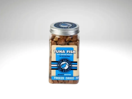 Pot de friandises lyophilisées au thon Kiwi Walker pour chiens et chats, posé sur un fond gris clair.