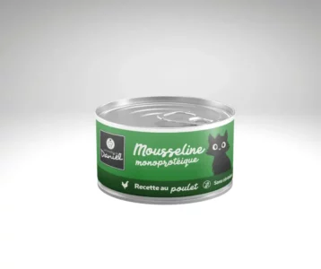 Boîte de mousseline pour chat de 85 g, étiquette verte avec un dessin de chat noir, posée sur un fond gris clair.